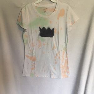 Handmade tie dyed tee shirt with a crown imprint